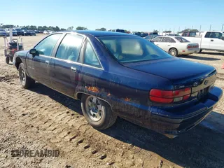 1991 Chevrolet Caprice z VIN 1G1BN53E2MW135068, wystawiony jako IAAI lot #40923869 z przebiegiem 185 732 mil mil oraz . Historia ofert i sprzedaży dostępna na DreamBid. Obrazek 3.