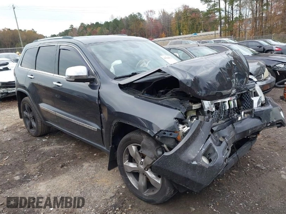 2012 Jeep Grand Cherokee Overland with VIN 1C4RJECT7CC334116, listed as a IAAI auction lot 40968071 with 98,794 mi miles. Bid and sale history available at carsss.com. Image 1.
