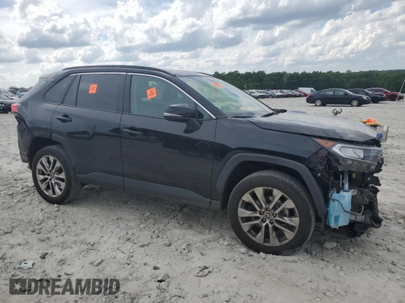 2021 Toyota RAV4 XLE Premium with VIN 2T3C1RFV9MW162776, listed as a Copart auction lot 55336675 with 79,060 mi miles and Salvage title. Bid and sale history available at DreamBid. Image 4.