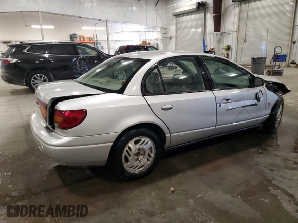 2002 Saturn SL z VIN 1G8ZK527X2Z267857, wystawiony jako Copart lot #46072975 z przebiegiem Nie podano mil oraz Szkoda całkowita • Salvage title. Historia ofert i sprzedaży dostępna na DreamBid. Obrazek 3.