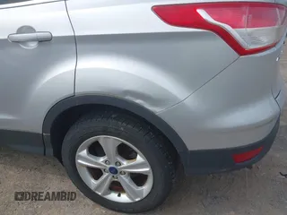 2014 Ford Escape SE z VIN 1FMCU9GX3EUB83978, wystawiony jako IAAI lot #42509549 z przebiegiem 121 388 mil mil oraz . Historia ofert i sprzedaży dostępna na DreamBid. Obrazek 6.