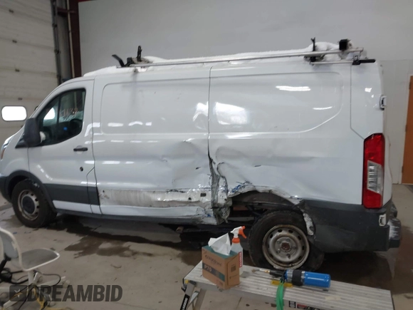 2018 Ford Transit with VIN 1FTYE1ZM6JKB50362, listed as a IAAI auction lot 41261638 with 151,266 mi miles and . Bid and sale history available at DreamBid. Image 15.