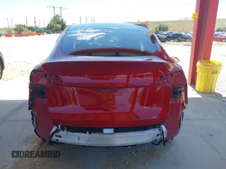 2020 Tesla Model Y Long Range with VIN 5YJYGDEE0LF029496, listed as a IAAI auction lot 41977695 with 47,958 mi miles and . Bid and sale history available at DreamBid. Image 15.