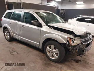 2013 Dodge Journey SE with VIN 3C4PDCAB7DT646083, listed as a IAAI auction lot 42353530 with 117,965 mi miles and . Bid and sale history available at DreamBid. Image 1.