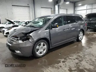 2013 Honda Odyssey Touring with VIN 5FNRL5H90DB071415, listed as a Copart auction lot 52697785 with 200,430 mi miles and Salvage Title. Bid and sale history available at carsss.com. Image 1.