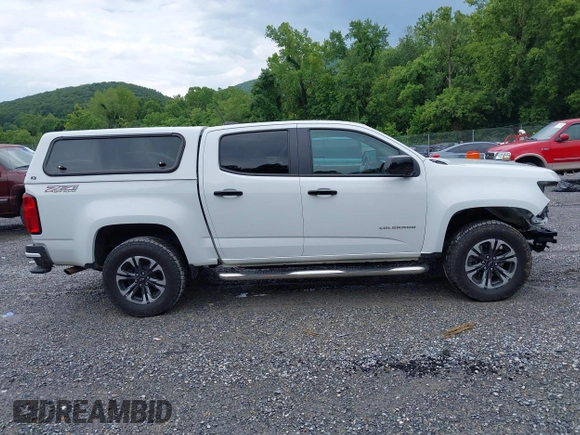 2021 Chevrolet Colorado 4WD Z71 with VIN 1GCGTDEN3M1122062, listed as a IAAI auction lot 42687632 with 52,233 mi miles and . Bid and sale history available at DreamBid. Image 13.