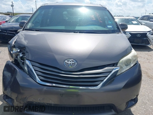 2014 Toyota Sienna XLE with VIN 5TDYK3DC0ES513076, listed as a IAAI auction lot 42724629 with 154,019 mi miles and . Bid and sale history available at DreamBid. Image 12.