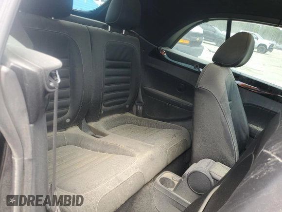 2014 Volkswagen Beetle 1.8T w/Premium z VIN 3VW517AT6EM816698, wystawiony jako Copart lot #57344055 z przebiegiem 52 782 mil mil oraz Szkoda całkowita • Salvage title. Historia ofert i sprzedaży dostępna na DreamBid. Obrazek 10.