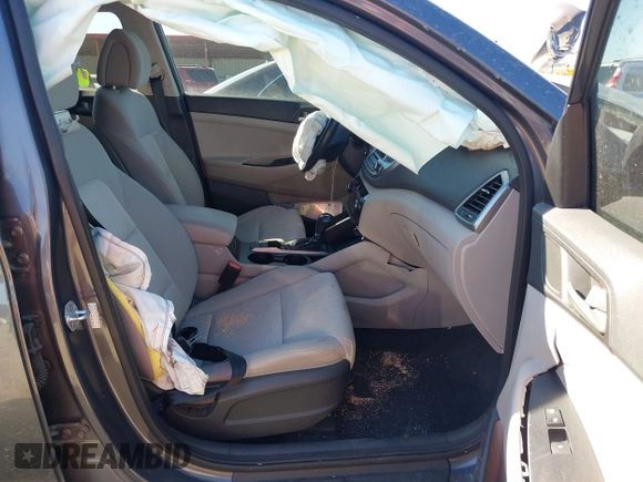 2018 Hyundai Tucson Sport with VIN KM8J33AL5JU770092, listed as a IAAI auction lot 41395349 with 101,395 mi miles. Bid and sale history available at carsss.com. Image 5.