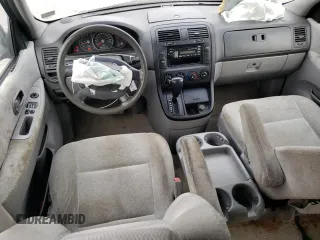 2005 Kia Sedona LX with VIN KNDUP131356628968, listed as a Copart auction lot 80255874 with 223,761 mi miles and Salvage Title. Bid and sale history available at carsss.com. Image 8.