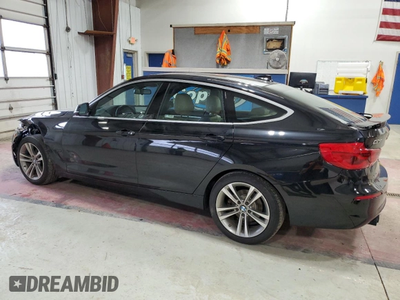 2019 BMW 3 Series 330i xDrive with VIN WBA8Z9C58KB220690, listed as a Copart auction lot 87442724 with 59,204 mi miles and Clean Title. Bid and sale history available at carsss.com. Image 2.