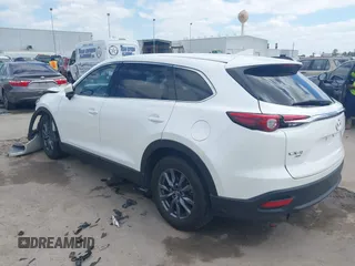 2022 Mazda CX-9 Touring with VIN JM3TCBCY0N0608052, listed as a IAAI auction lot 42027465 with 65,313 mi miles and . Bid and sale history available at DreamBid. Image 3.