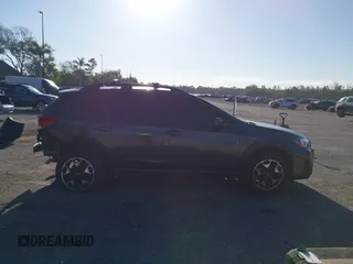 2020 Subaru Crosstrek Premium z VIN JF2GTAEC0L8252370, wystawiony jako IAAI lot #42029389 z przebiegiem 47 090 mil mil oraz . Historia ofert i sprzedaży dostępna na DreamBid. Obrazek 13.