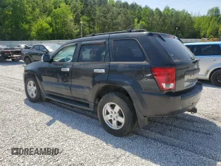 2005 Jeep Grand Cherokee Laredo with VIN 1J4HS48N85C570784, listed as a Copart auction lot 53668255 with 165,223 mi miles and Clean Title. Bid and sale history available at DreamBid. Image 2.
