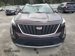 2020 Cadillac XT4 FWD Premium Luxury with VIN 1GYFZCR42LF149030, listed as a Copart auction lot 82671894 with 88,570 mi miles and Salvage Title. Bid and sale history available at carsss.com. Image 5.