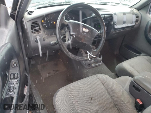 2001 Ford Ranger XLT Appearance with VIN 1FTYR14E11PA62827, listed as a Copart auction lot 87845045 with 142,748 mi miles and Salvage Title. Bid and sale history available at DreamBid. Image 8.