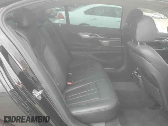 2019 BMW 7 Series 740i xDrive z VIN WBA7E4C55KGV70212, wystawiony jako Copart lot #57330965 z przebiegiem 48 408 mil mil oraz Szkoda całkowita • Salvage title. Historia ofert i sprzedaży dostępna na DreamBid. Obrazek 10.