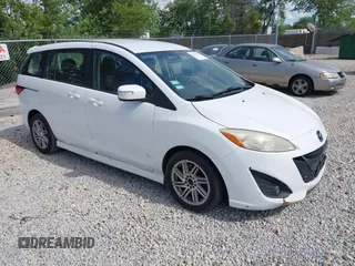 2013 Mazda 5 Touring with VIN JM1CW2CL5D0152097, listed as a IAAI auction lot 42611731 with 230,179 mi miles and . Bid and sale history available at DreamBid. Image 1.