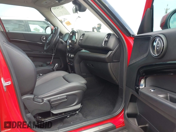 2023 MINI Countryman Cooper S z VIN WMZ53BR02P3R00984, wystawiony jako IAAI lot #42744505 z przebiegiem 27 432 mil mil oraz . Historia ofert i sprzedaży dostępna na DreamBid. Obrazek 5.