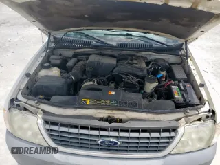 2002 Ford Explorer XLS with VIN 1FMZU62E62UA69368, listed as a Copart auction lot 61571065 with 124,095 mi miles and Salvage title. Bid and sale history available at DreamBid. Image 12.