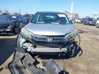 2016 Honda CR-V LX with VIN 2HKRM4H3XGH633670, listed as a IAAI auction lot 41765499 with 74,775 mi miles. Bid and sale history available at carsss.com. Image 12.