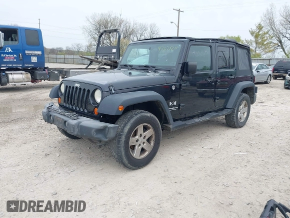 2007 Jeep Wrangler Unlimited X with VIN 1J4GA39177L153387, listed as a IAAI auction lot 42021211 with 207,965 mi miles and . Bid and sale history available at DreamBid. Image 2.