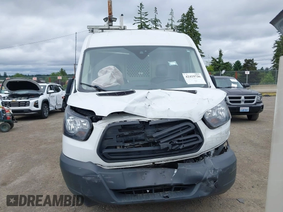 2018 Ford Transit Cargo z VIN 1FTYR2CGXJKB29432, wystawiony jako IAAI lot #42419726 z przebiegiem 80 543 mil mil oraz . Historia ofert i sprzedaży dostępna na DreamBid. Obrazek 6.