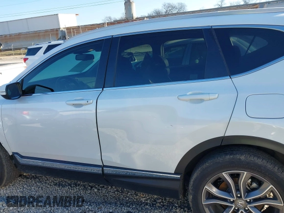 2020 Honda CR-V Touring with VIN 2HKRW2H91LH643923, listed as a IAAI auction lot 41258484 with 48,543 mi miles and . Bid and sale history available at DreamBid. Image 14.