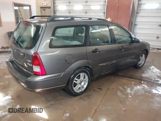 2005 Ford Focus SE with VIN 1FAFP36N45W158796, listed as a IAAI auction lot 41823987 with 145,803 mi miles and . Bid and sale history available at carsss.com. Image 4.