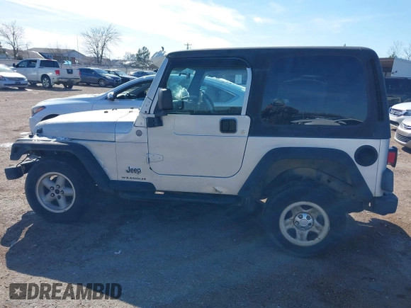 2004 Jeep Wrangler Sport Right Hand Drive with VIN 1J4F449SX4P780560, listed as a IAAI auction lot 41645721 with 146,681 mi miles. Bid and sale history available at carsss.com. Image 13.
