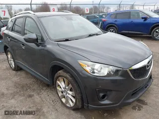 2015 Mazda CX-5 Grand Touring with VIN JM3KE4DY3F0534028, listed as a IAAI auction lot 42057440 with 151,426 mi miles. Bid and sale history available at carsss.com. Image 1.