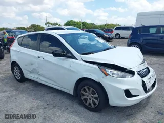 2013 Hyundai Accent GL with VIN KMHCT5AE1DU092600, listed as a IAAI auction lot 41901615 with 126,327 mi miles. Bid and sale history available at carsss.com. Image 1.