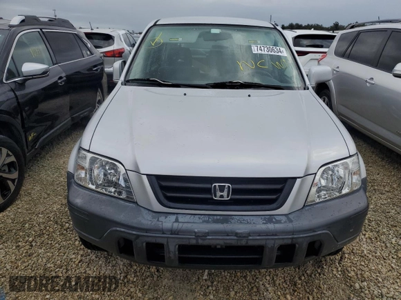 1999 Honda CR-V EX with VIN JHLRD1865XC064542, listed as a Copart auction lot 74730634 with 71,298 mi miles and Salvage Title. Bid and sale history available at carsss.com. Image 5.