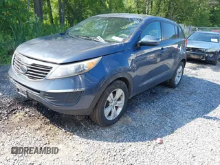 2012 Kia Sportage LX with VIN KNDPBCA28C7294317, listed as a IAAI auction lot 42759427 with 177,538 mi miles and . Bid and sale history available at DreamBid. Image 2.
