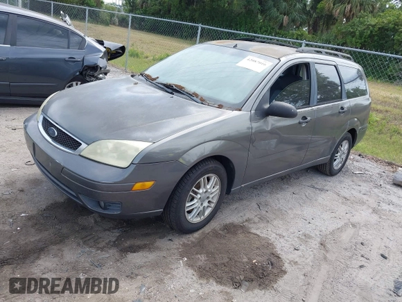 2005 Ford Focus SE with VIN 1FAFP36N35W211505, listed as a IAAI auction lot 42087016 with 256,413 mi miles and . Bid and sale history available at carsss.com. Image 2.