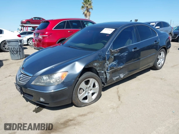 2006 Acura RL z VIN JH4KB16516C004396, wystawiony jako IAAI lot #41959850 z przebiegiem 114 670 mil mil oraz . Historia ofert i sprzedaży dostępna na DreamBid. Obrazek 16.