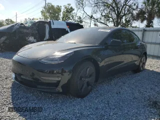 2022 Tesla Model 3 with VIN 5YJ3E1EA1NF374390, listed as a Copart auction lot 52709455 with 44,212 mi miles and Non Repairable. Bid and sale history available at carsss.com. Image 1.