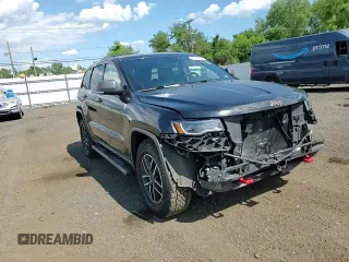 2019 Jeep Grand Cherokee Trailhawk with VIN 1C4RJFLT8KC726784, listed as a Copart auction lot 66010235 with 136,683 mi miles and Salvage title. Bid and sale history available at DreamBid. Image 15.