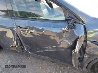 2022 Tesla Model Y Long Range z VIN 7SAYGDEE7NA006476, wystawiony jako IAAI lot #41894606 z przebiegiem 63 380 mil mil oraz . Historia ofert i sprzedaży dostępna na DreamBid. Obrazek 6.