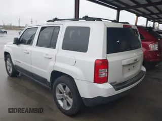 2014 Jeep Patriot Latitude with VIN 1C4NJPFA3ED618523, listed as a IAAI auction lot 41108657 with 124,035 mi miles and . Bid and sale history available at carsss.com. Image 3.