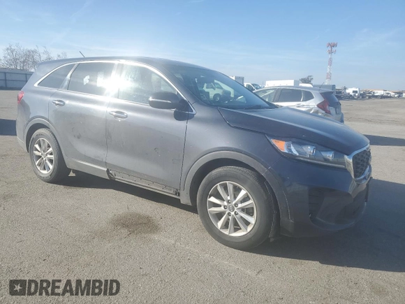 2019 Kia Sorento LX with VIN 5XYPG4A55KG455080, listed as a Copart auction lot 46253135 with 112,415 mi miles and Salvage Title. Bid and sale history available at DreamBid. Image 4.