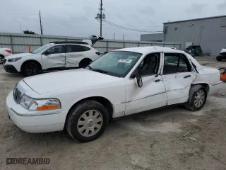 2003 Mercury Grand Marquis LS Premium with VIN 2MEHM75W53X697294, listed as a Copart auction lot 73021464 with 118,480 mi miles and Salvage Title. Bid and sale history available at carsss.com. Image 1.