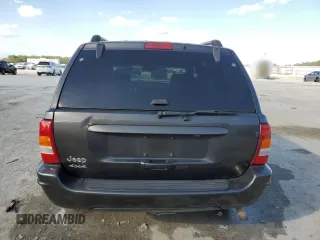 2004 Jeep Grand Cherokee Limited with VIN 1J4GW58S24C374012, listed as a Copart auction lot 44896325 with 153,978 mi miles and Salvage title. Bid and sale history available at DreamBid. Image 6.