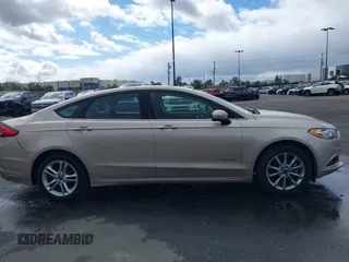 2017 Ford Fusion Hybrid SE with VIN 3FA6P0LU0HR355269, listed as a IAAI auction lot 41745299 with 97,675 mi miles and . Bid and sale history available at DreamBid. Image 13.