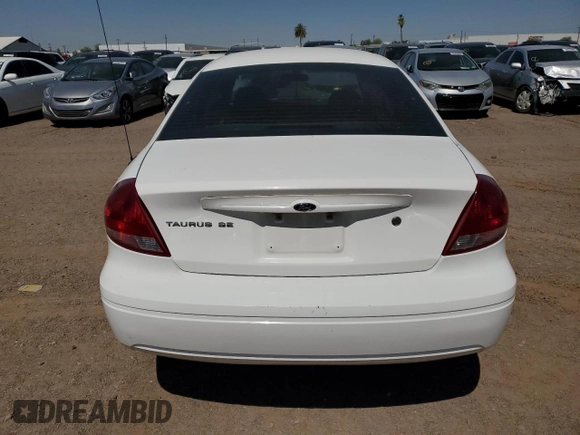 2006 Ford Taurus SE with VIN 1FAFP53UX6A194398, listed as a Copart auction lot 59582515 with 114,933 mi miles and Salvage title. Bid and sale history available at DreamBid. Image 6.