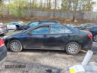 2014 Toyota Camry L with VIN 4T4BF1FK7ER395057, listed as a IAAI auction lot 42215441 with 166,247 mi miles and . Bid and sale history available at DreamBid. Image 15.