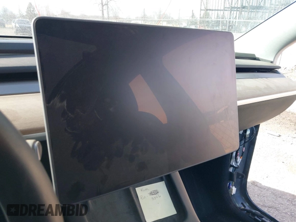 2023 Tesla Model Y Performance with VIN 7SAYGDEF7PF590750, listed as a IAAI auction lot 41694002 with Not Provided miles and . Bid and sale history available at DreamBid. Image 15.