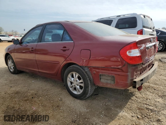 2004 Toyota Camry LE with VIN 4T1BF32K94U080450, listed as a Copart auction lot 50993005 with 141,265 mi miles and Salvage Title. Bid and sale history available at carsss.com. Image 2.