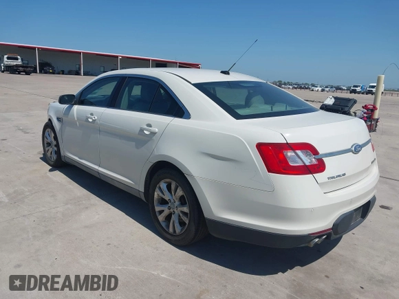 2011 Ford Taurus SEL z VIN 1FAHP2HW7BG148004, wystawiony jako IAAI lot #42245047 z przebiegiem 102 999 mil mil oraz . Historia ofert i sprzedaży dostępna na DreamBid. Obrazek 3.
