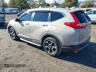 2017 Honda CR-V Touring with VIN 5J6RW2H94HL013536, listed as a IAAI auction lot 41577317 with 97,132 mi miles. Bid and sale history available at carsss.com. Image 3.